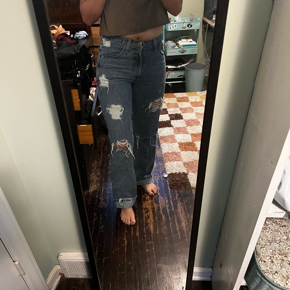 Custom destressed cinch bronze label jeans